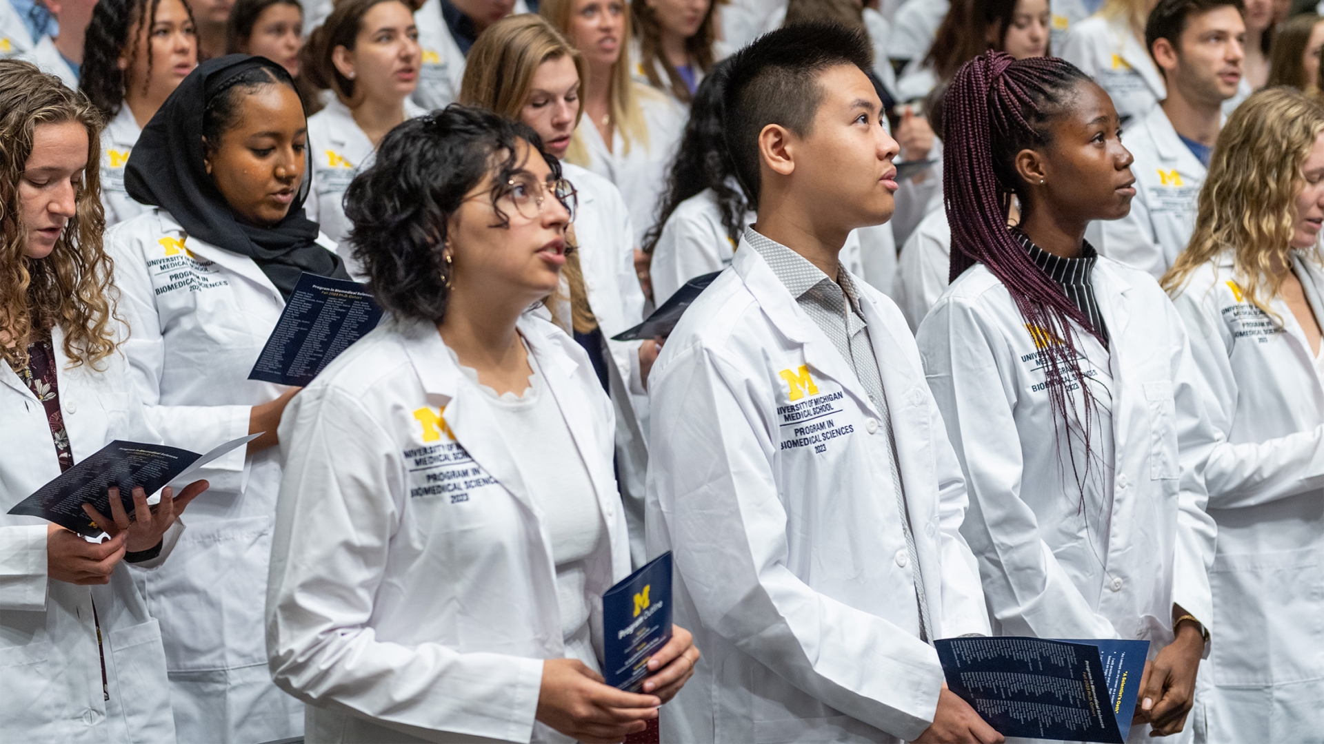 Group of diverse young people at U-M Medical School White Coat Ceremony