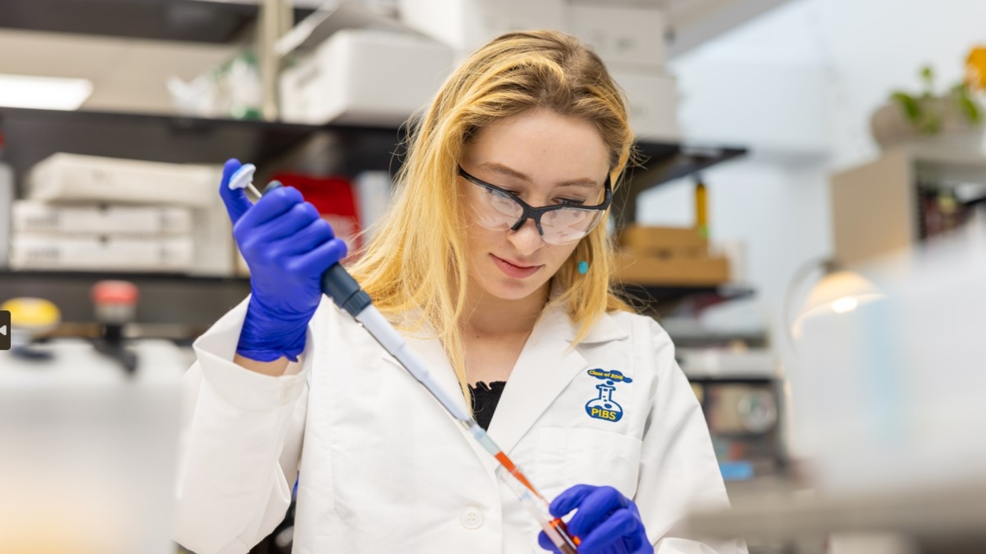 A Pharmacology researcher studies a chemical in the Traynor Lab
