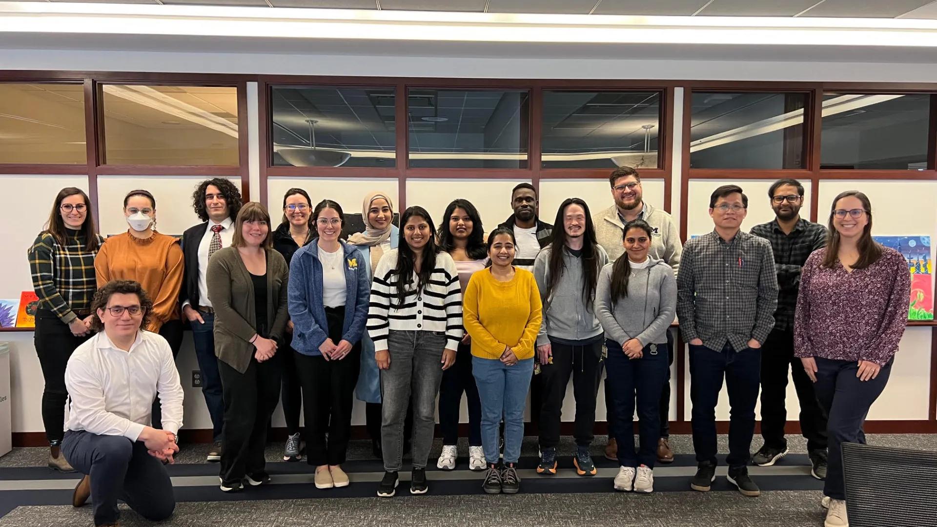 A group of about 18 postdoctoral trainees in a group