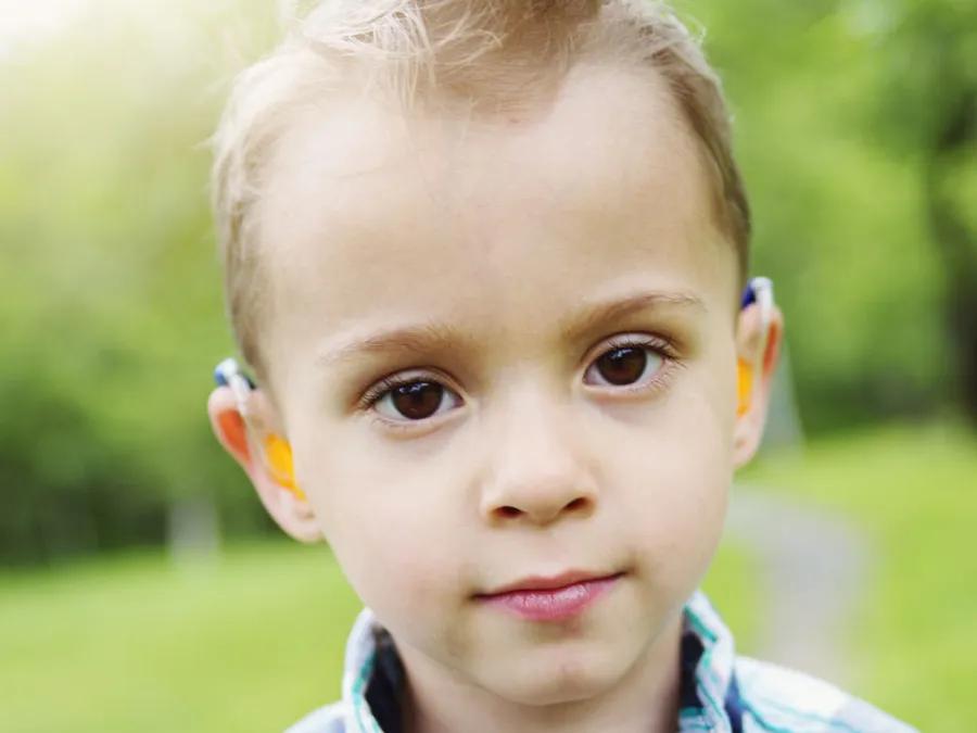 A young child with cochlear implants