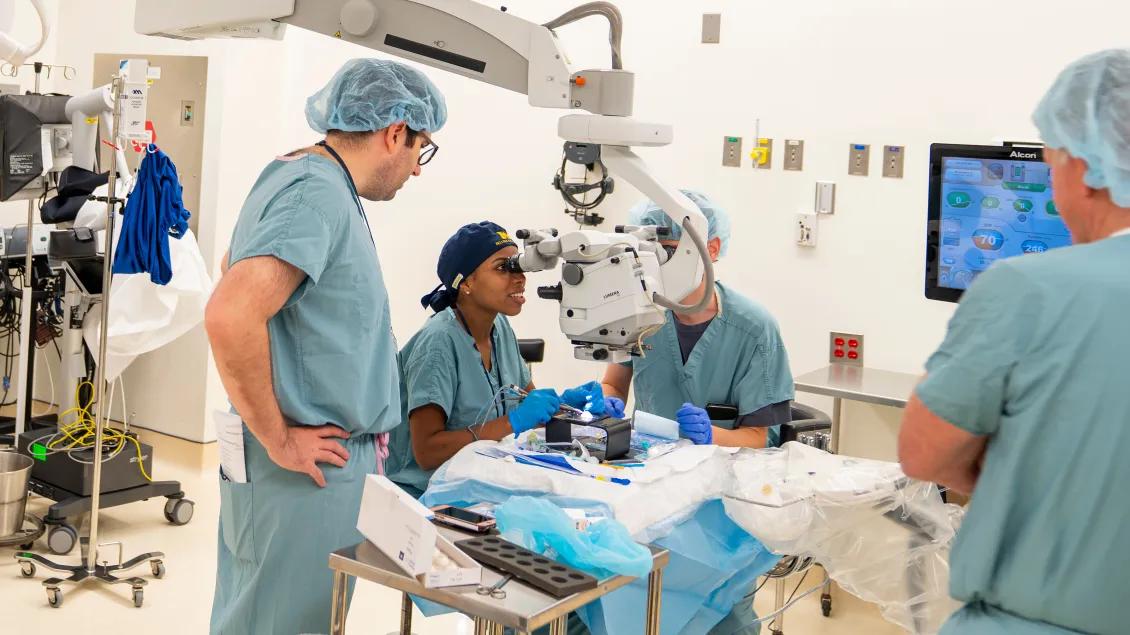 eye surgeons operating in surgical room 