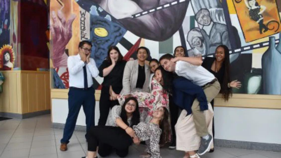 a group of people posing for a photo
