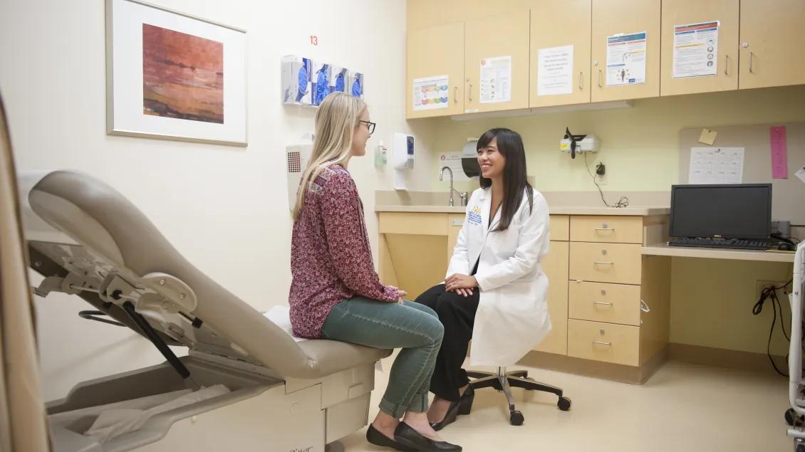 Dr. Lim speaks with a patient