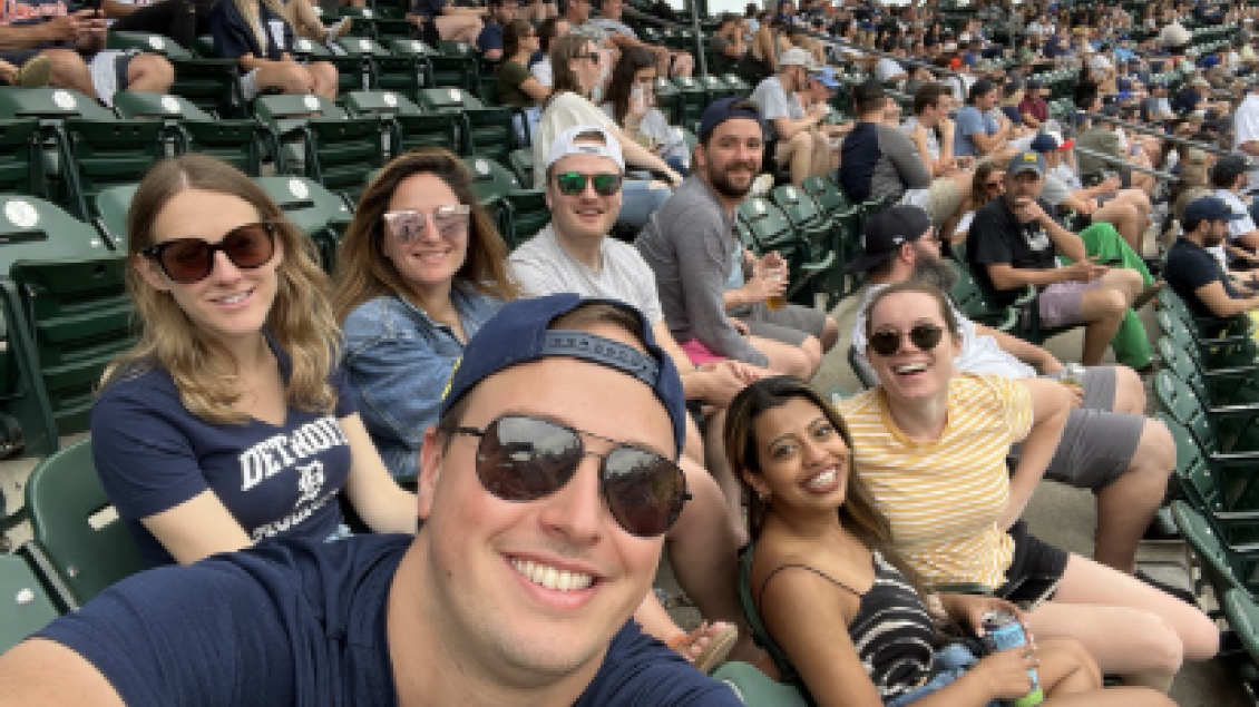Neurology residents pose for a photo at a Detroit Tigers game