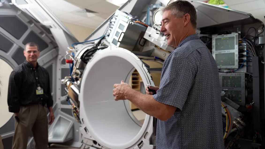 Radiation Oncology staff shows a large machine