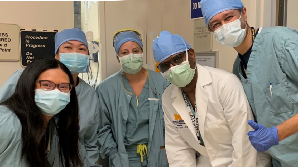 Health care providers pose for a photo