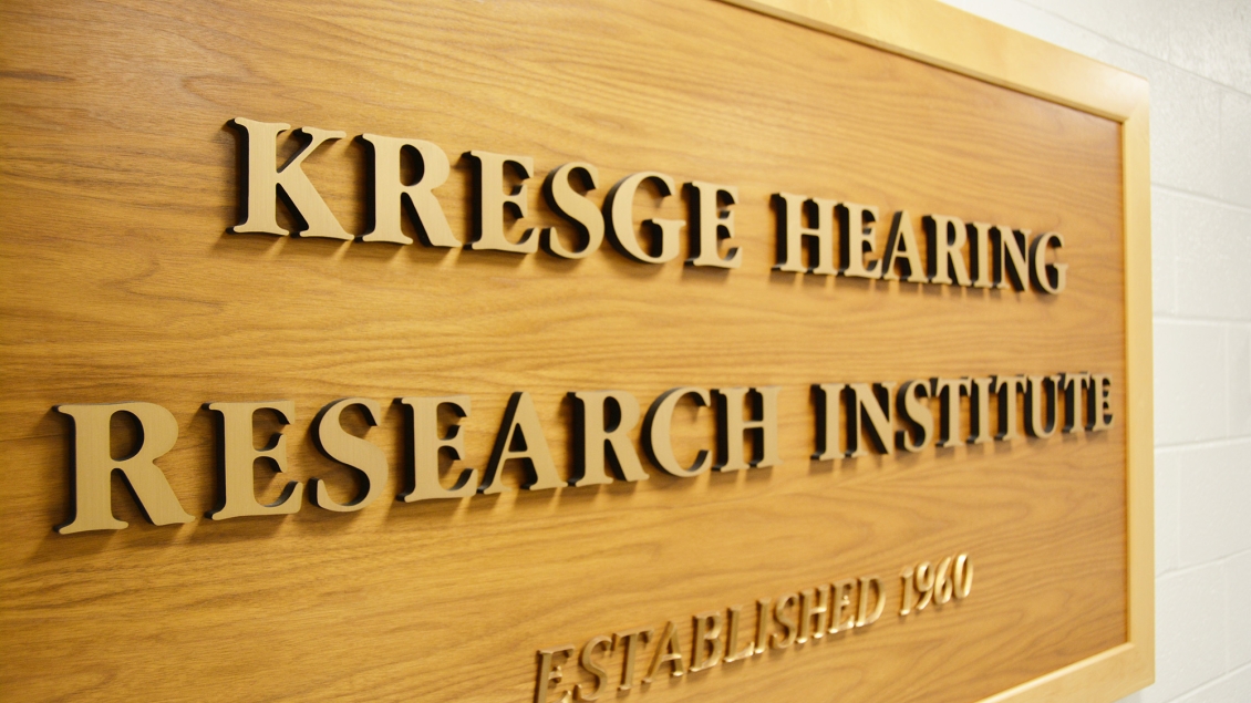 Photo of the Kresge Hearing Research Institute wooden sign