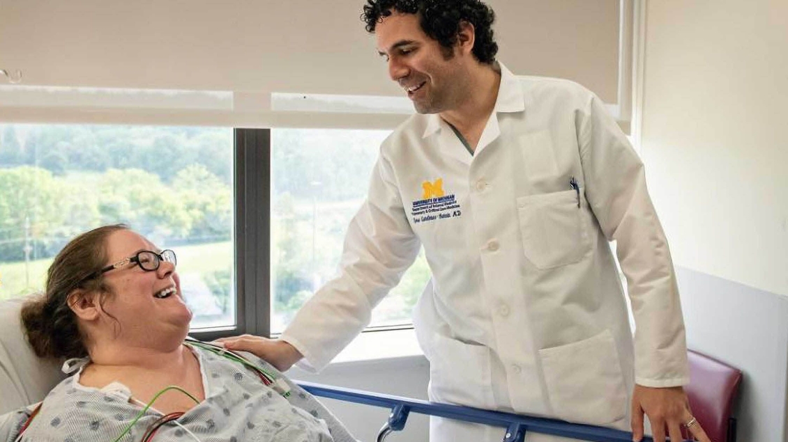 A doctor working with a patient