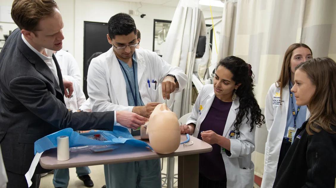 practicing breathing tube insertion in simulation