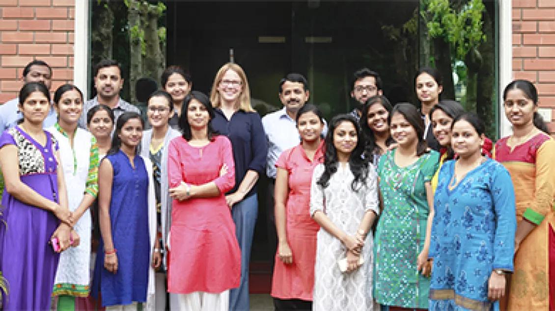 A group of people smiling for the camera