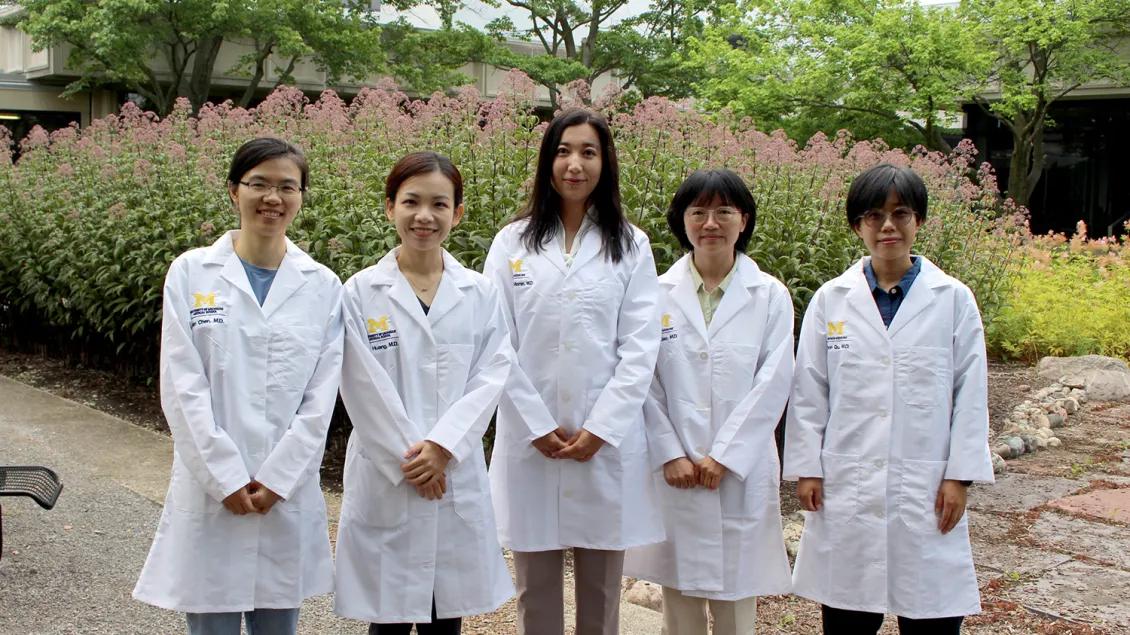 A group of female fellows outside