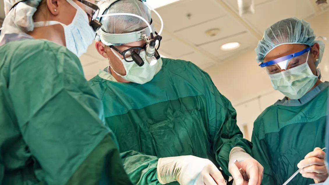 Dr. Eliason and surgical team in the operating room