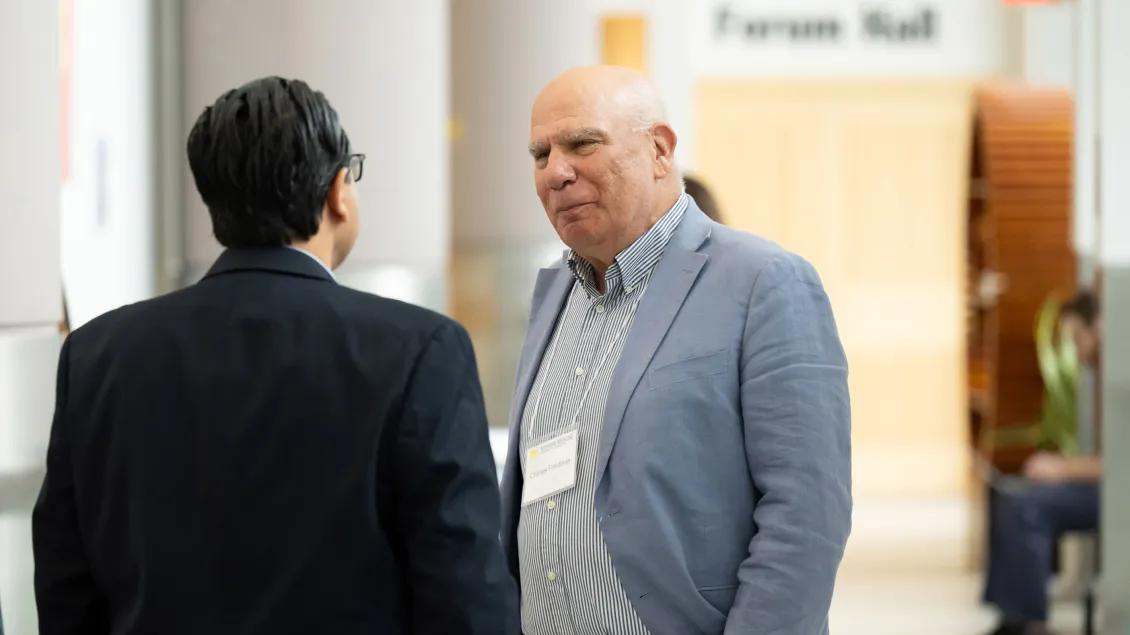 faculty engaging in corridor