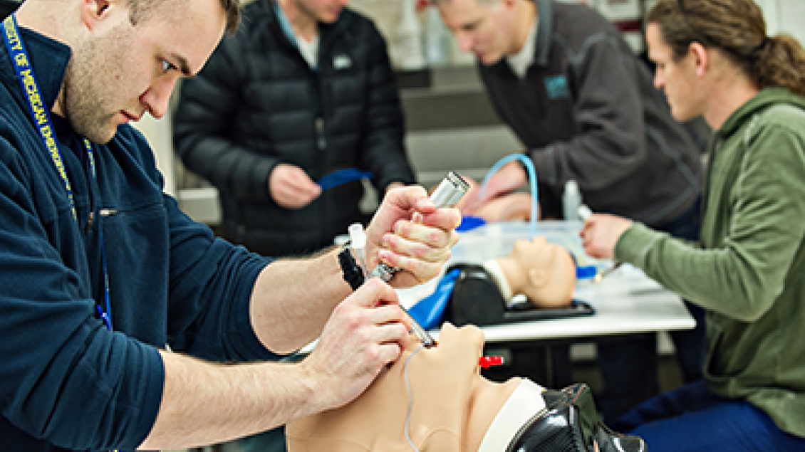 Students working on lab dummies