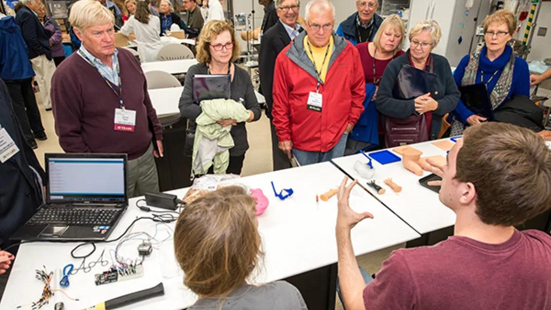 A group of people talking at an open conference