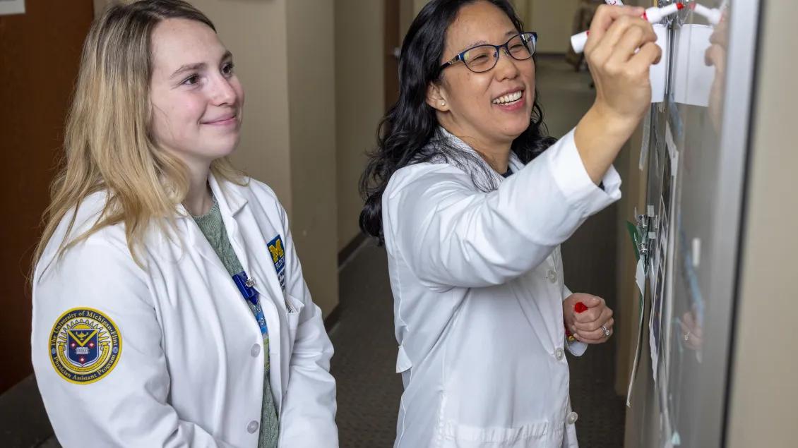 Dr Fan left with a PA student
