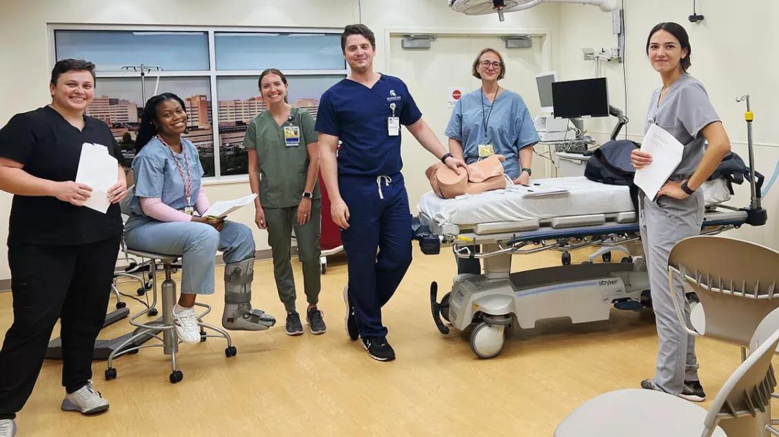 residents learning together in clinical setting