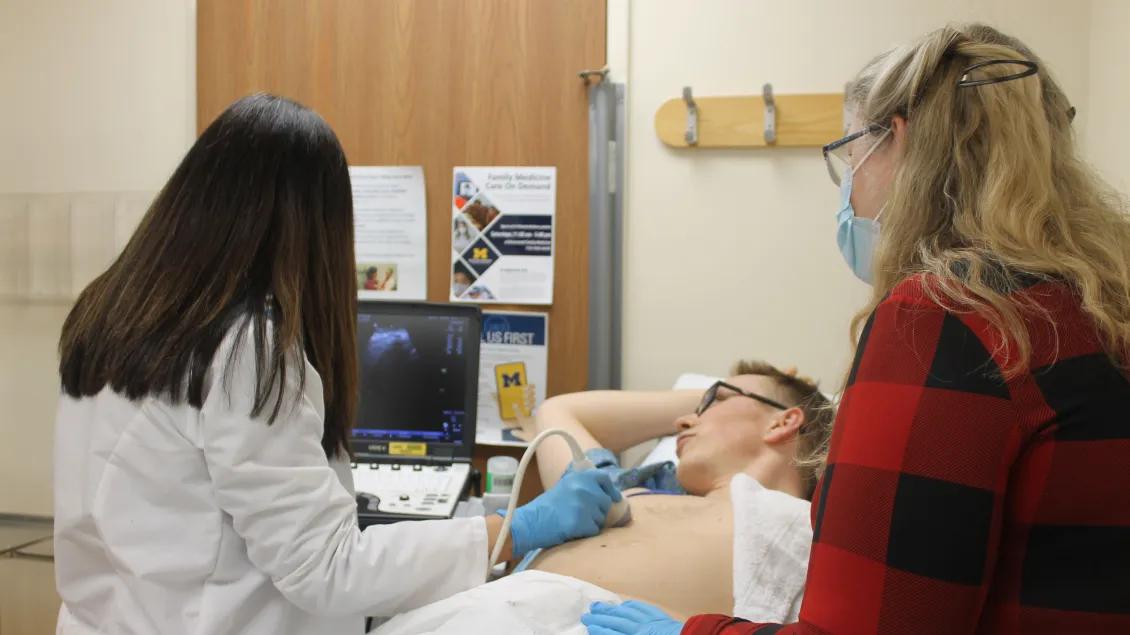 Family medicine team members doing an ultrasound