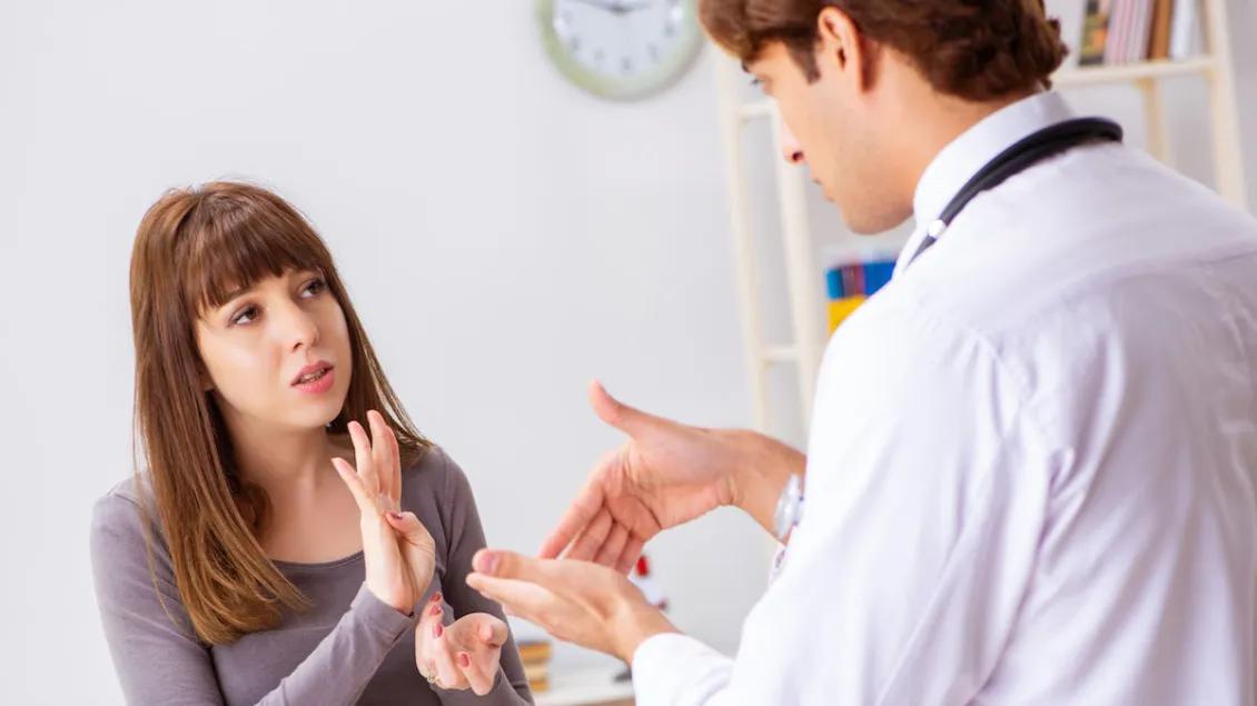 Doctor and patient using sign language