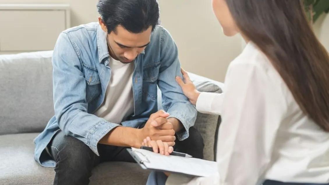 A person in a therapy session