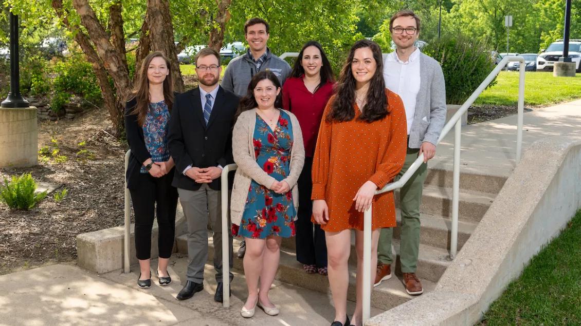Group of psychiatry trainees standing on steps outside