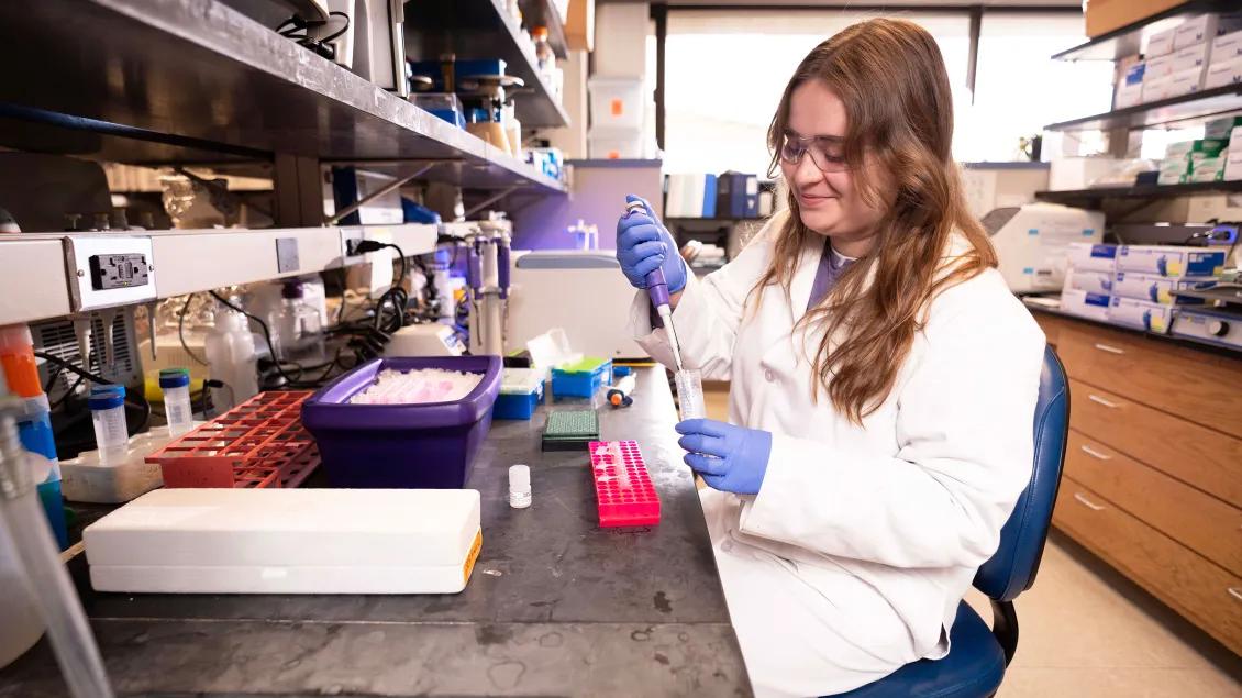 Lab member working in the lab
