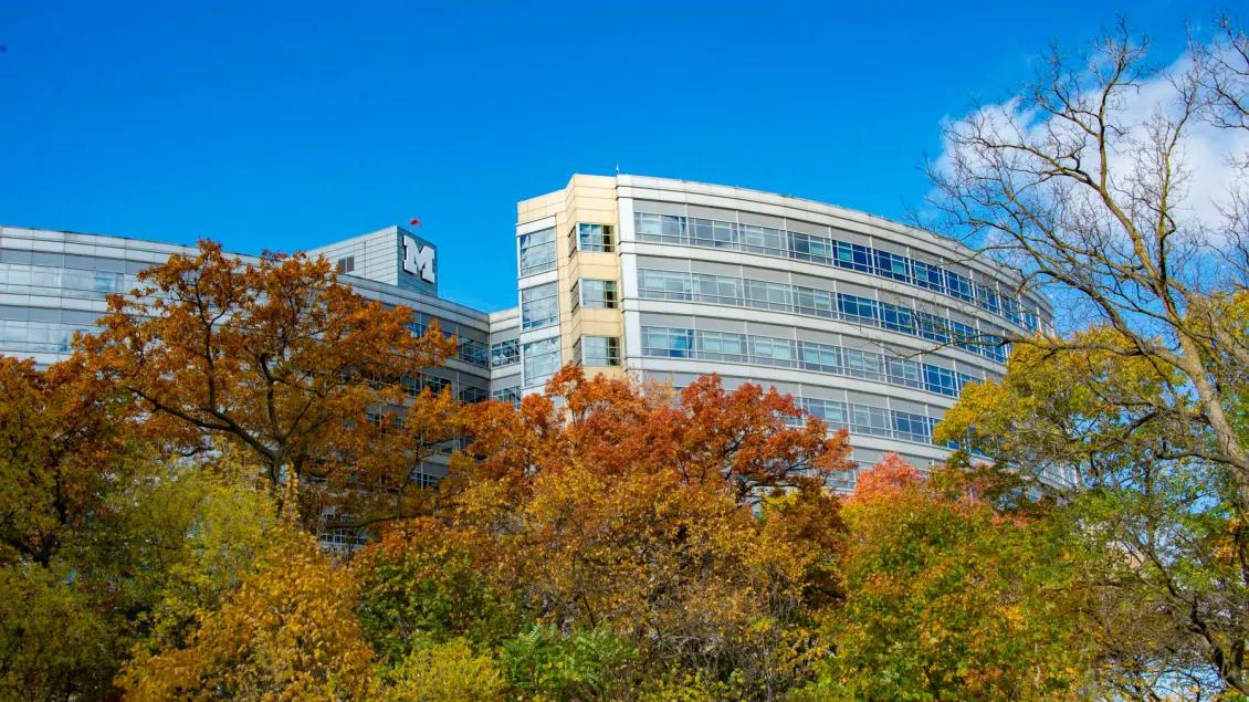 C.S. Mott Children's Hospital and trees with autumn leaves