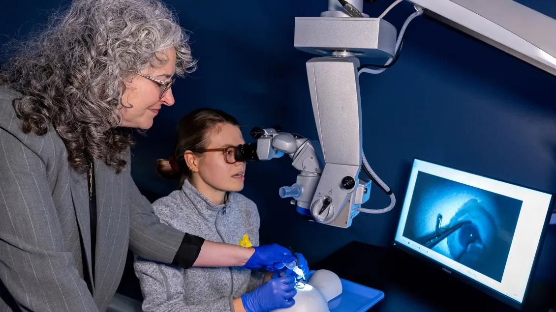 Dr. Kaplan instructing a resident on surgical technique