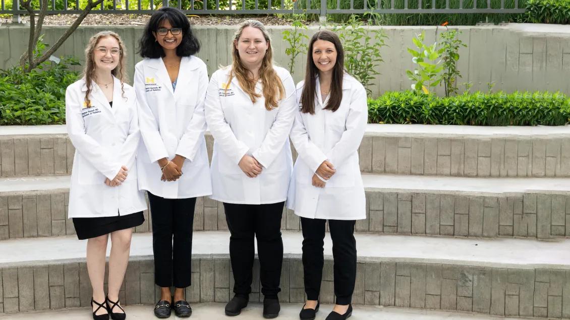 Group of pediatric child neurology residents in white coats