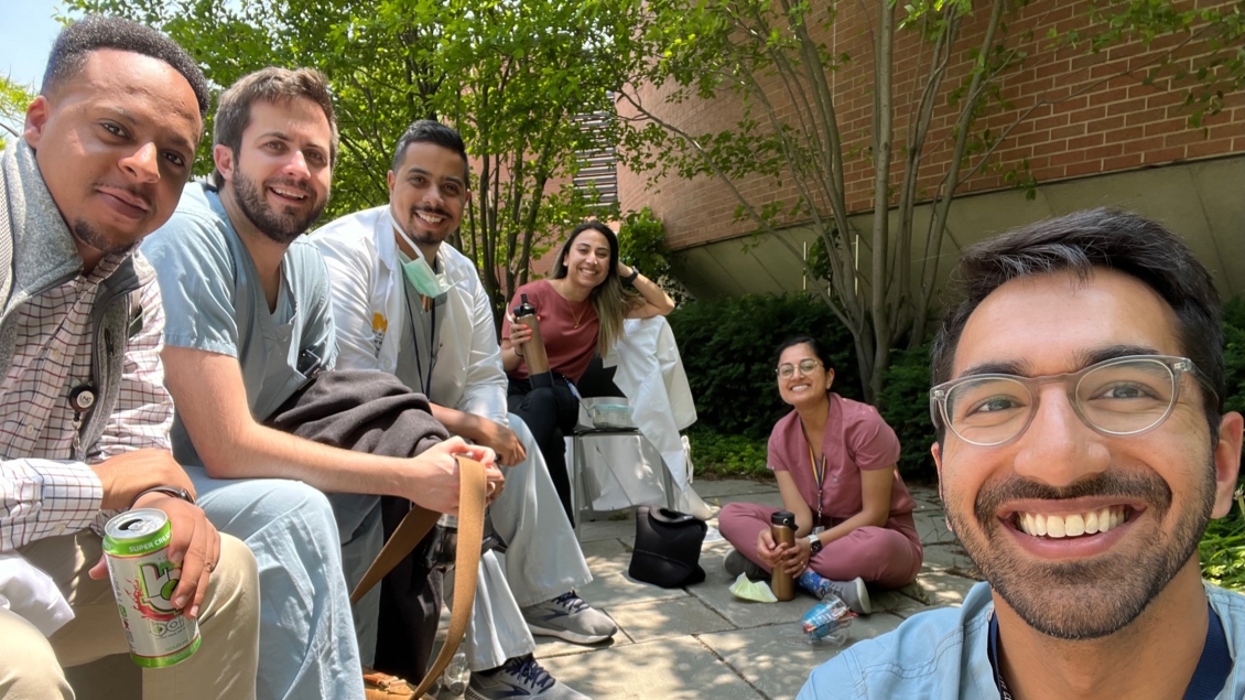 Ophthalmology residents sitting in the courtyard
