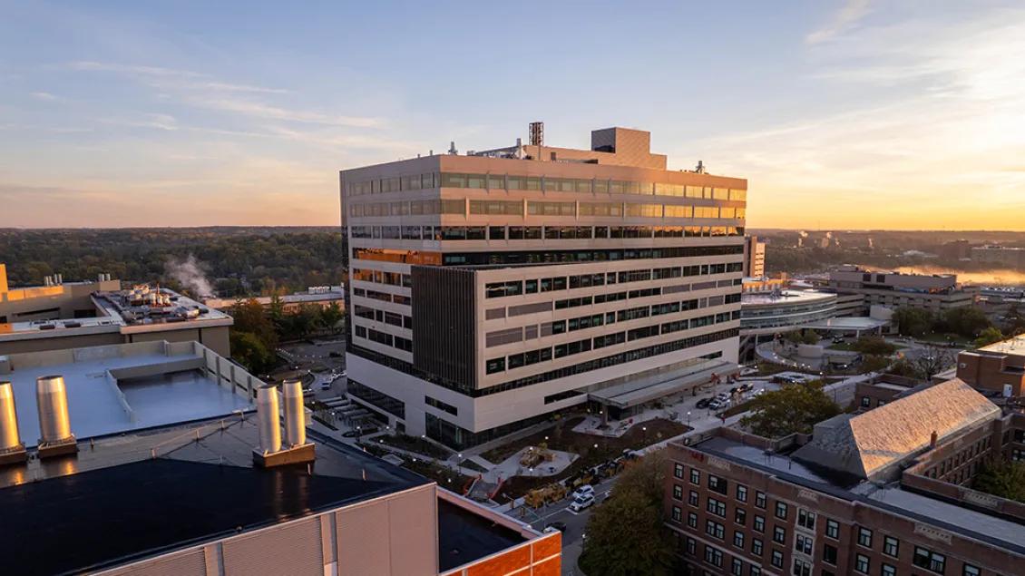 U-M Pavilion building with sunset in the background