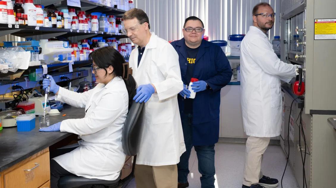 Group of scientists working in a lab