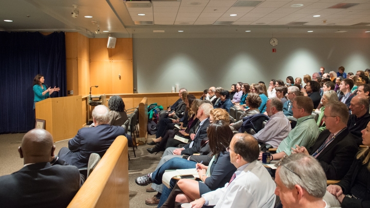  audience listens during OBGYN Professorship and Endowment Lecture.