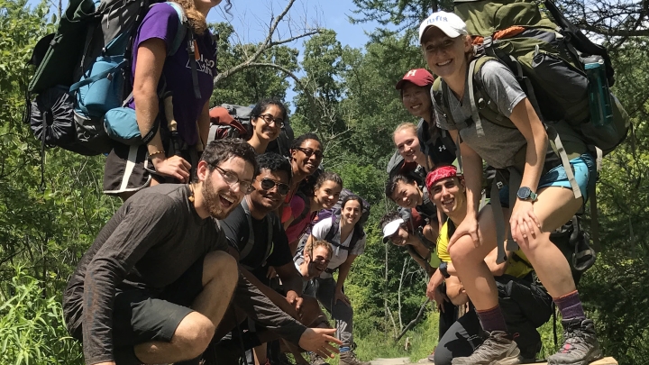 Group of people with hiking backpacks