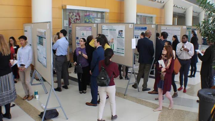Event picture - crowd viewing academic posters
