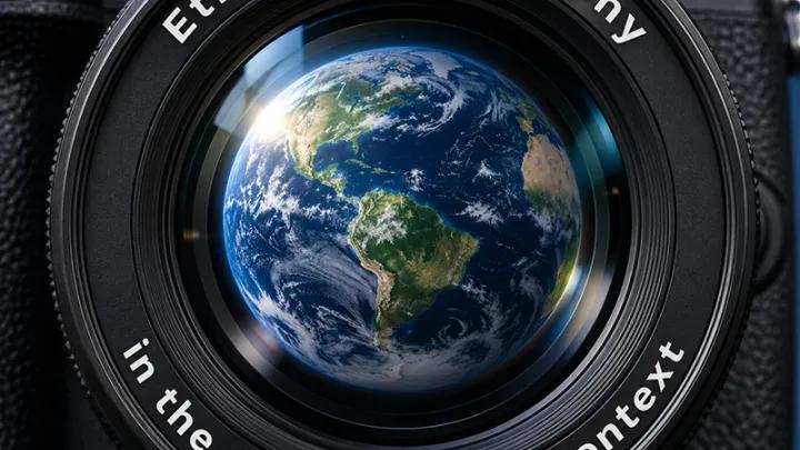 Earth reflected in camera lens with event title
