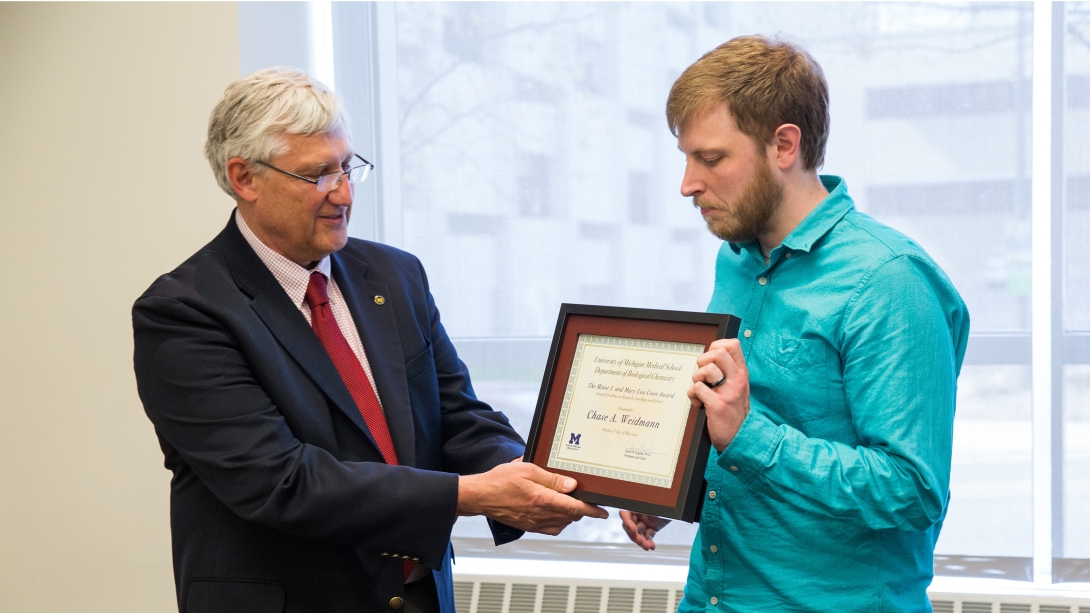 student receiving the Minor J. and Mary Lou Coon Award 