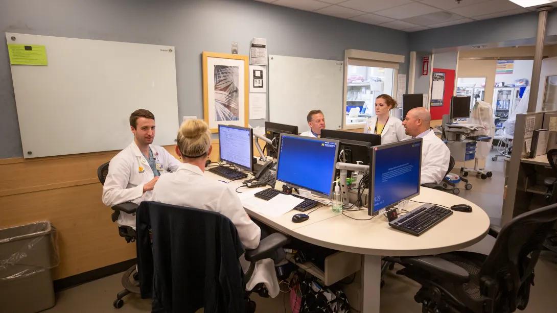 doctors working on computers