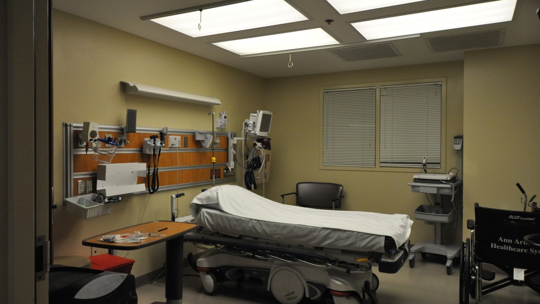 patient bed in exam room 