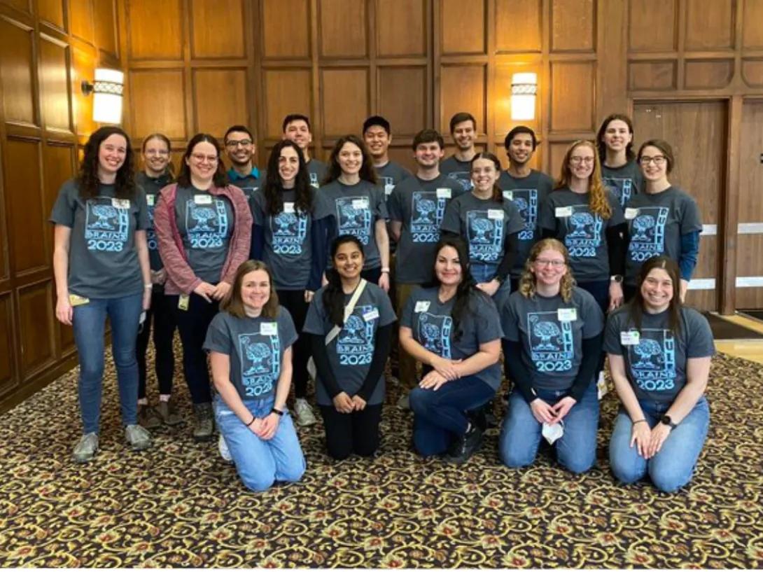 Outreach program group photo wearing matching shirts 