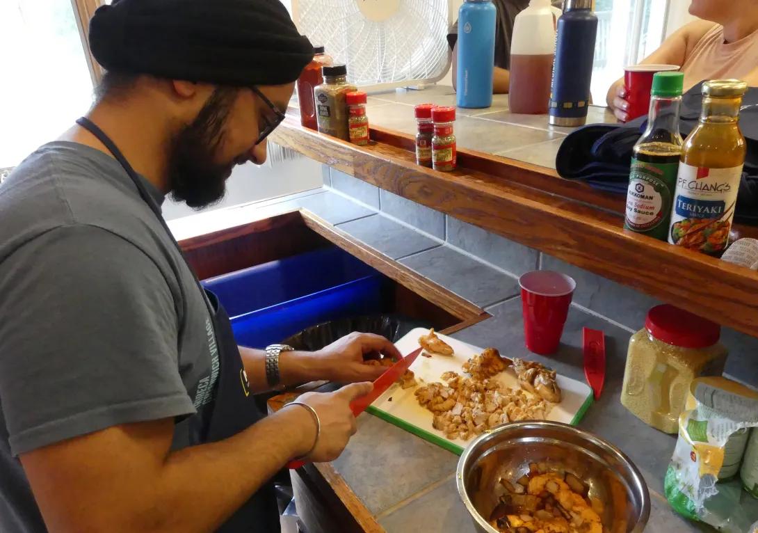 Man cooking in kitchen for culinary connections