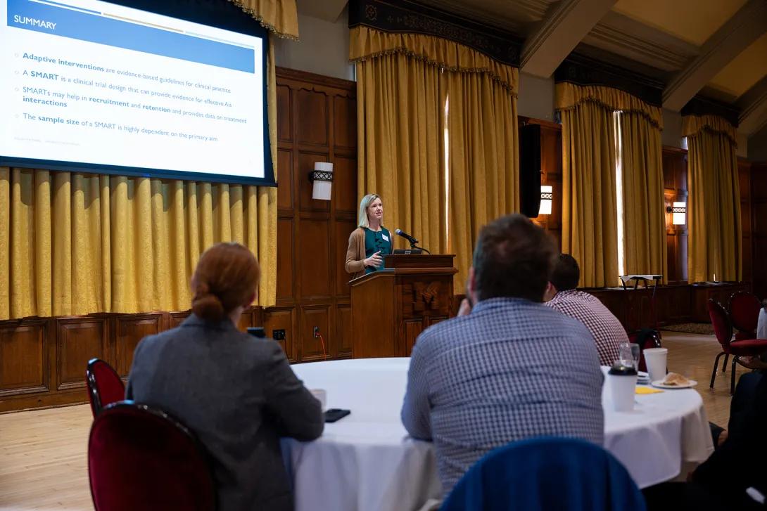 Kelley Kidwell, Ph.D. presents at the podium