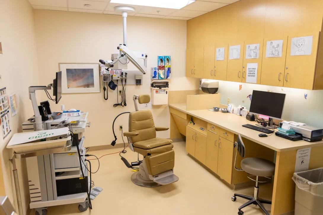 OTO peds exam room with chair and equipment