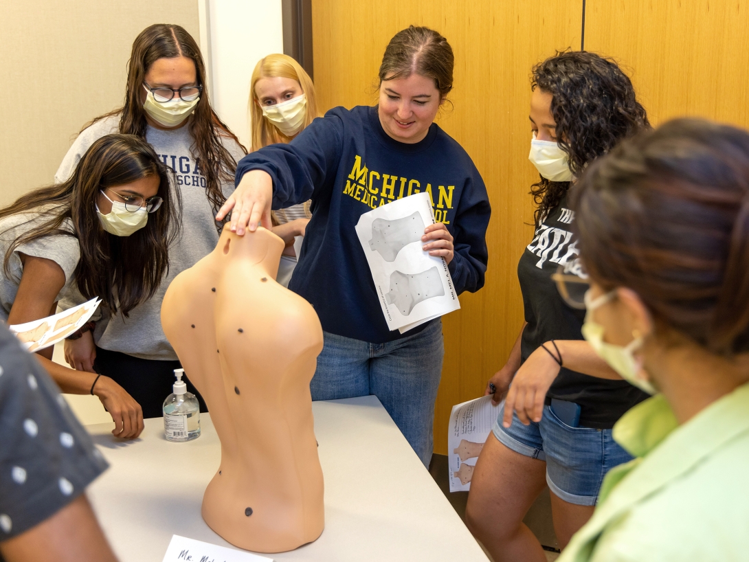 Simulation exercise using fake body to demonstrate to residents 