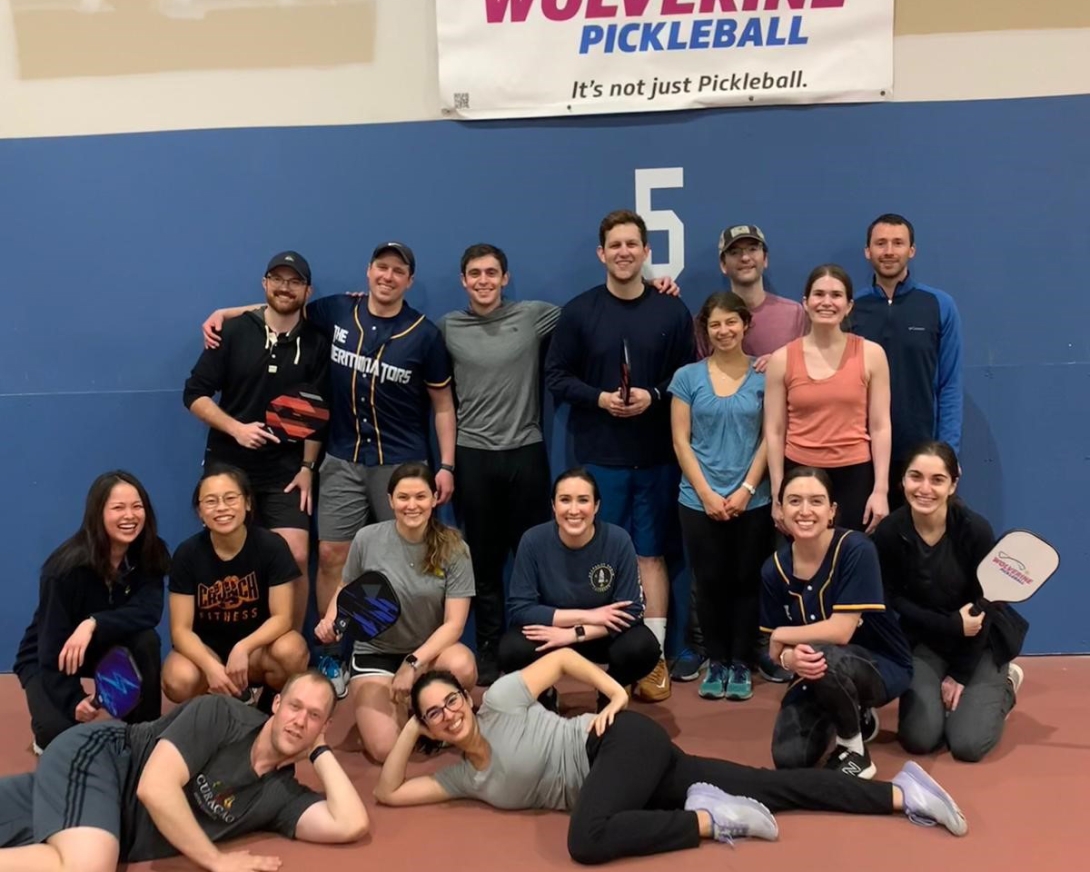 Dermatology residents pose for a photo after playing pickleball