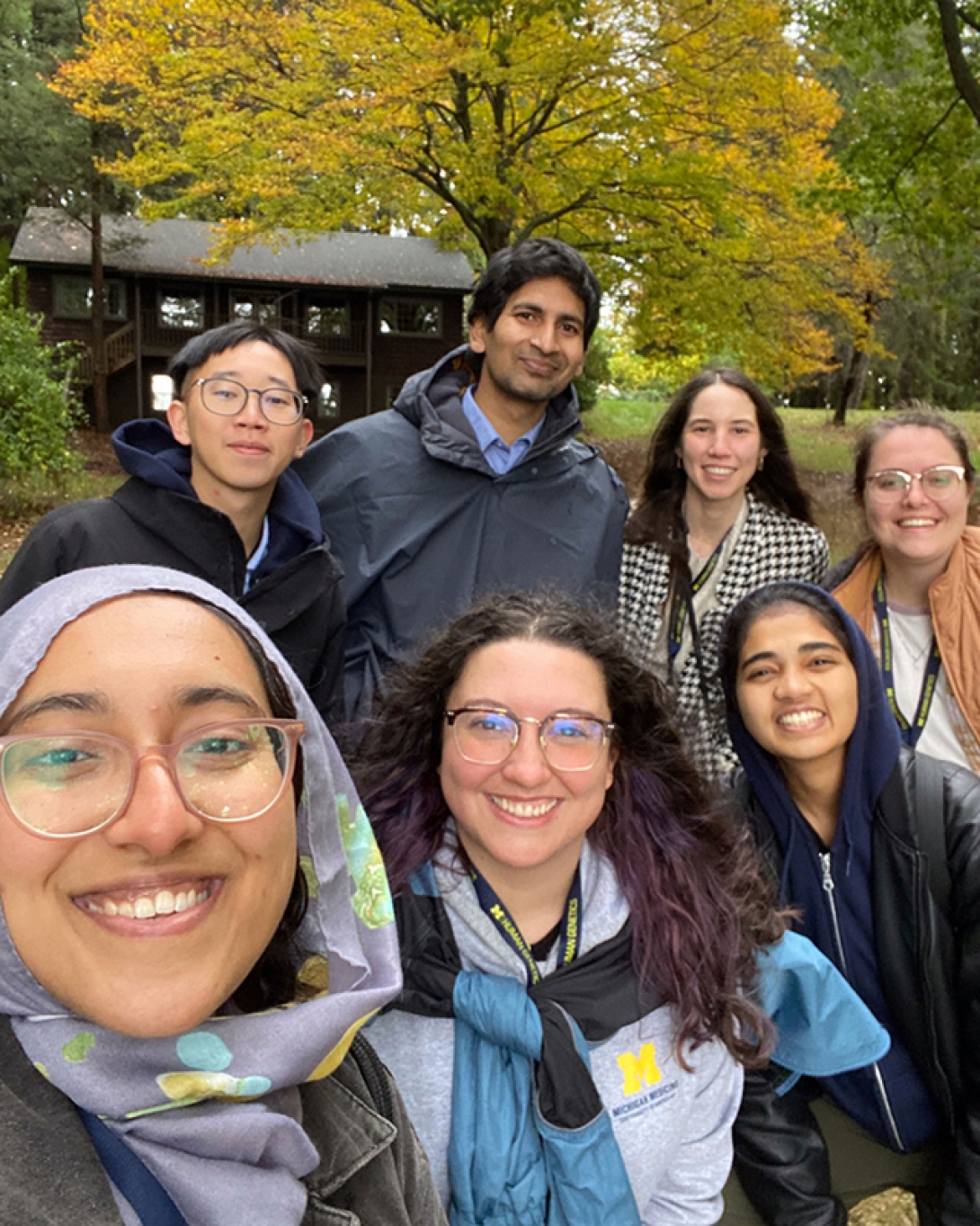 group selfie of students outside in the fall weather 