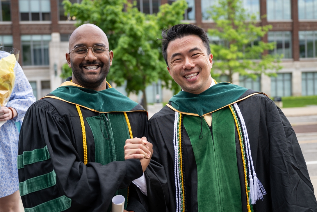 Two medical school graduates