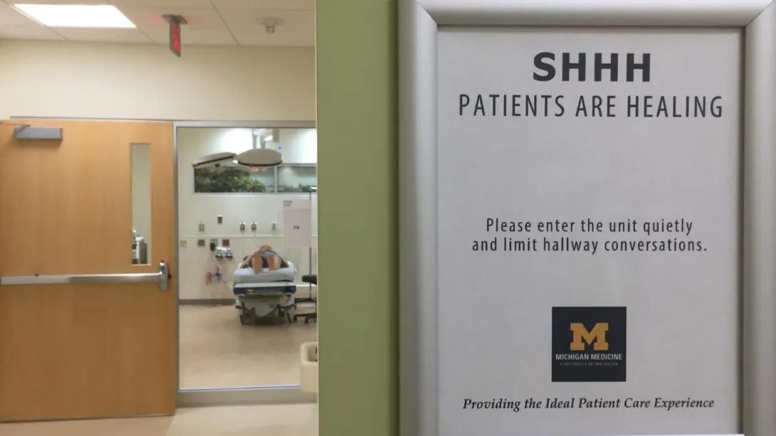 A sign in a hallway