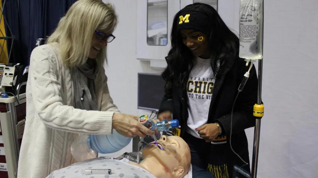Two people in simulation training