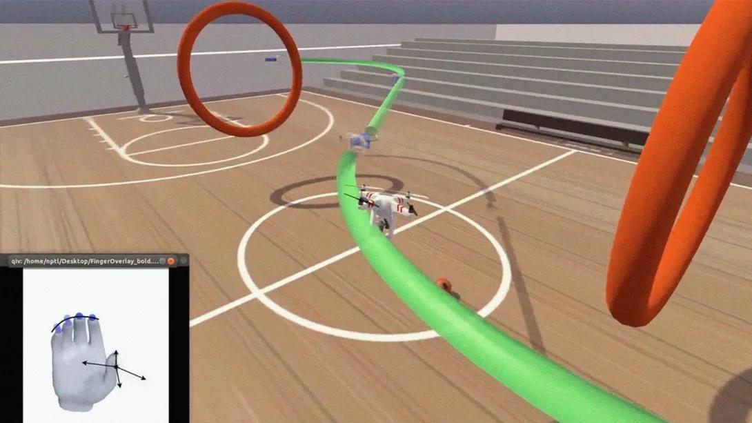 screenshot of video used for patients looks like basketball court and orange rings and green wire going through court